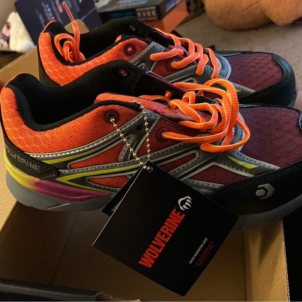 Size 5.5 Wolverine steel toe sneakers never worn but need a good home. I